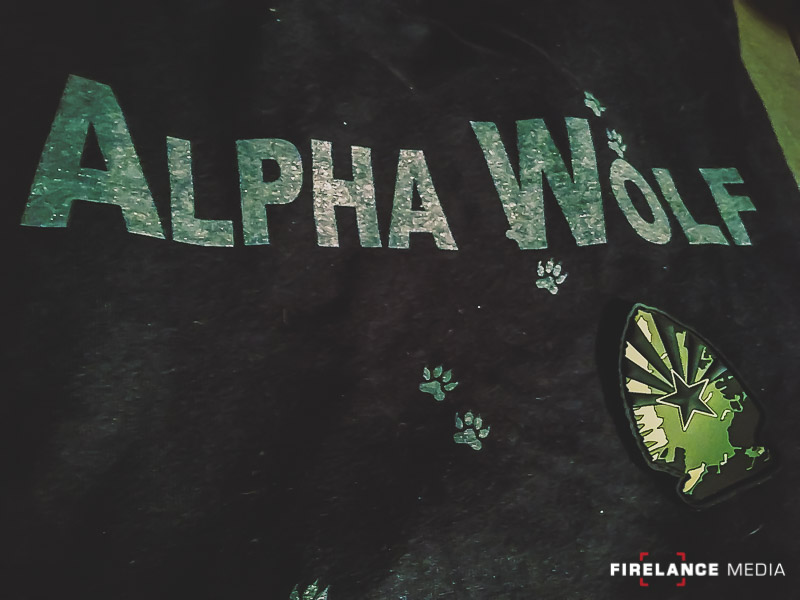 The Alpha Wolf shirt and Greenside Training Patch. Both must be earned.