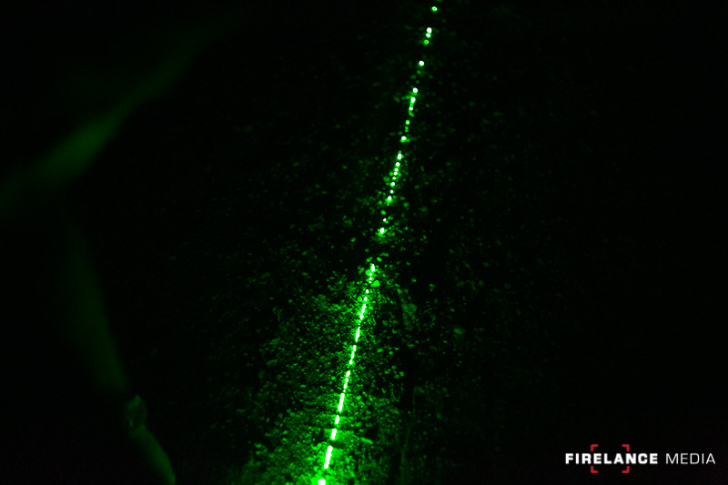 Using a green laser to indicate a track's direction of travel and the "toe digs"